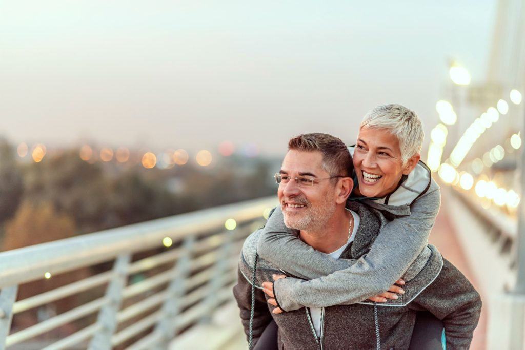 Happy couple enjoying retirement, confident in their Medicare coverage